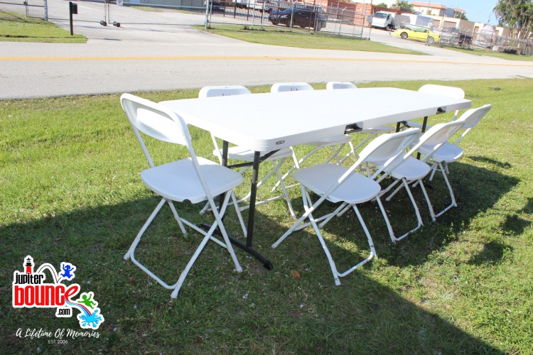 Two 8' tables and 20 folding chairs Two 8' tables and 20 folding chairs